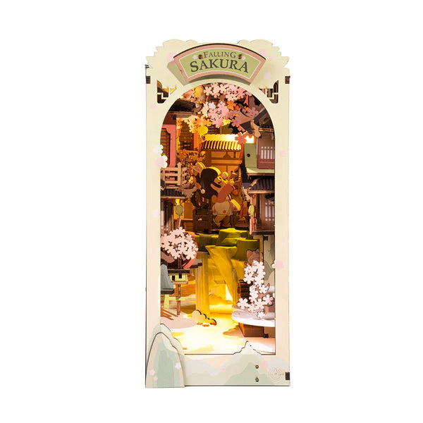 Miniature cherry blossom village book nook with LED lights