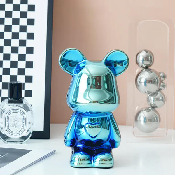glossy bear ornament with sculptural detailing