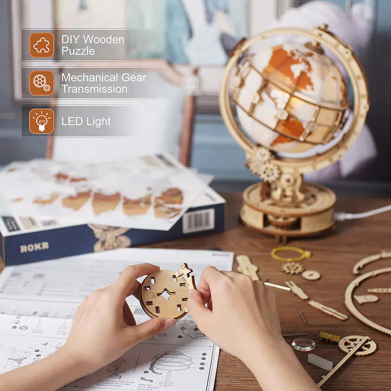 Globe puzzle kit with decorative base