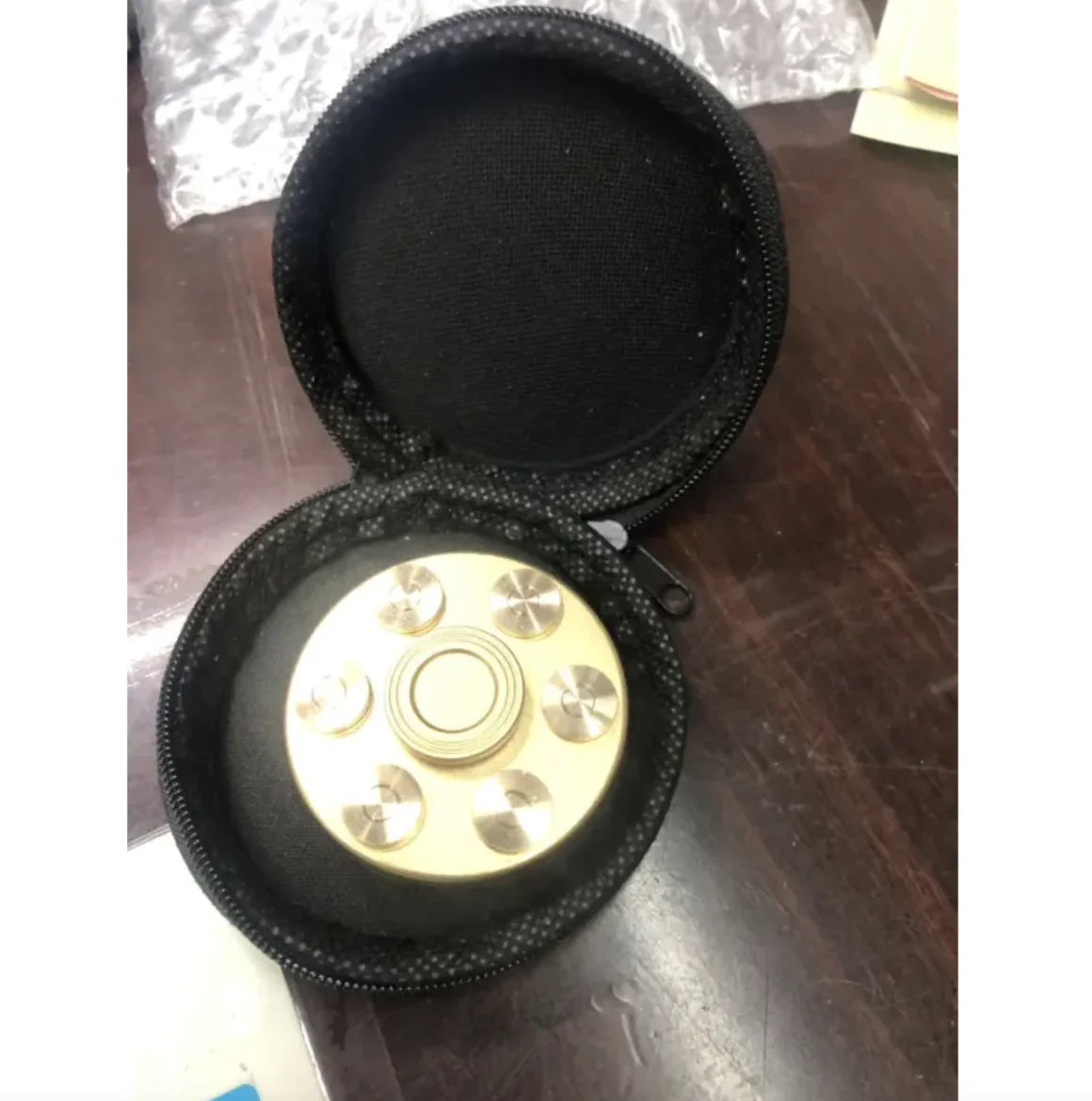 Brass revolver fidget spinner toy for desks and display