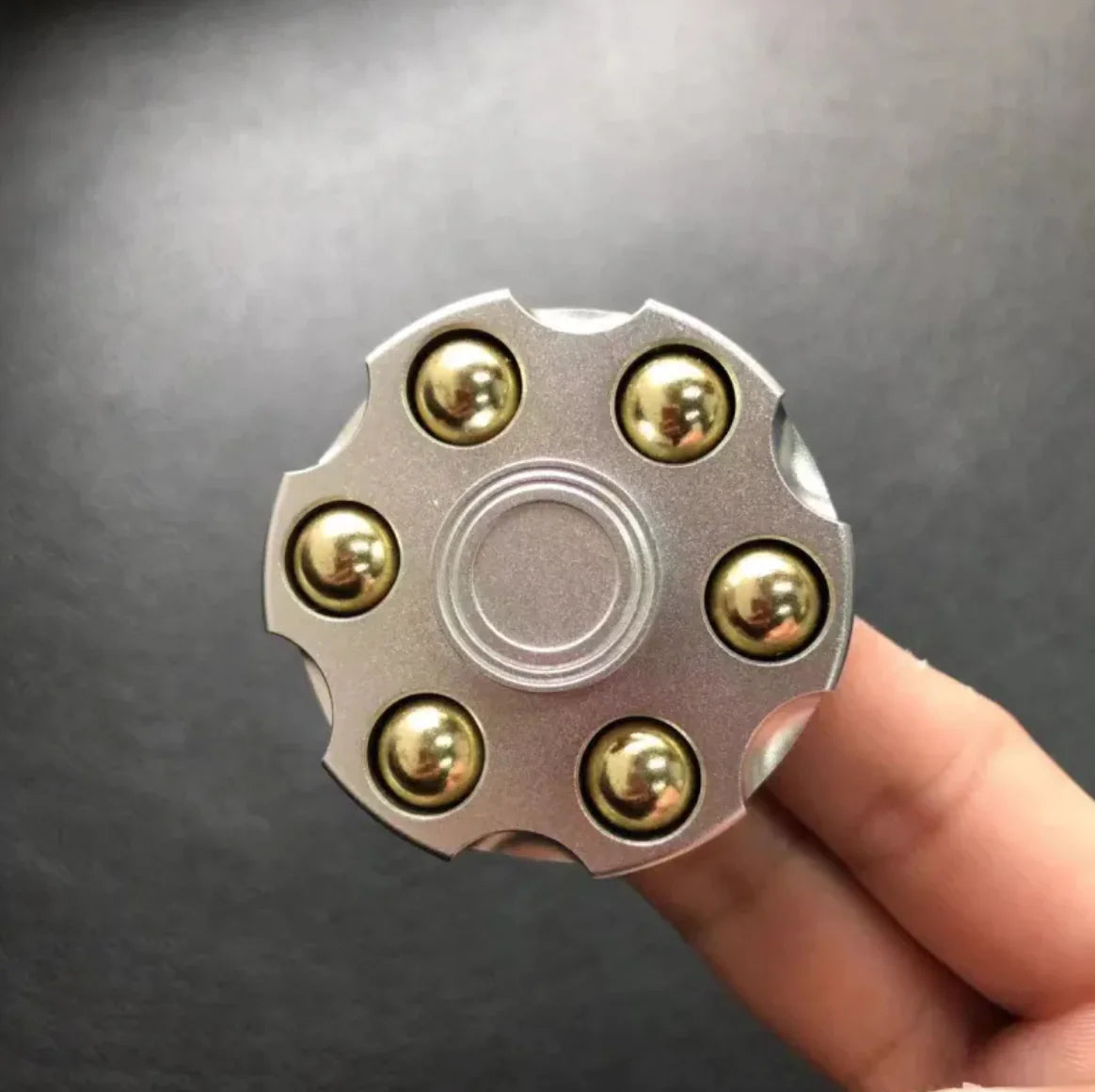 Oddly Epic cowboy revolver spinner with bullet details
