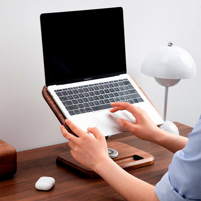 Walnut wood stand to support laptop at comfortable viewing height