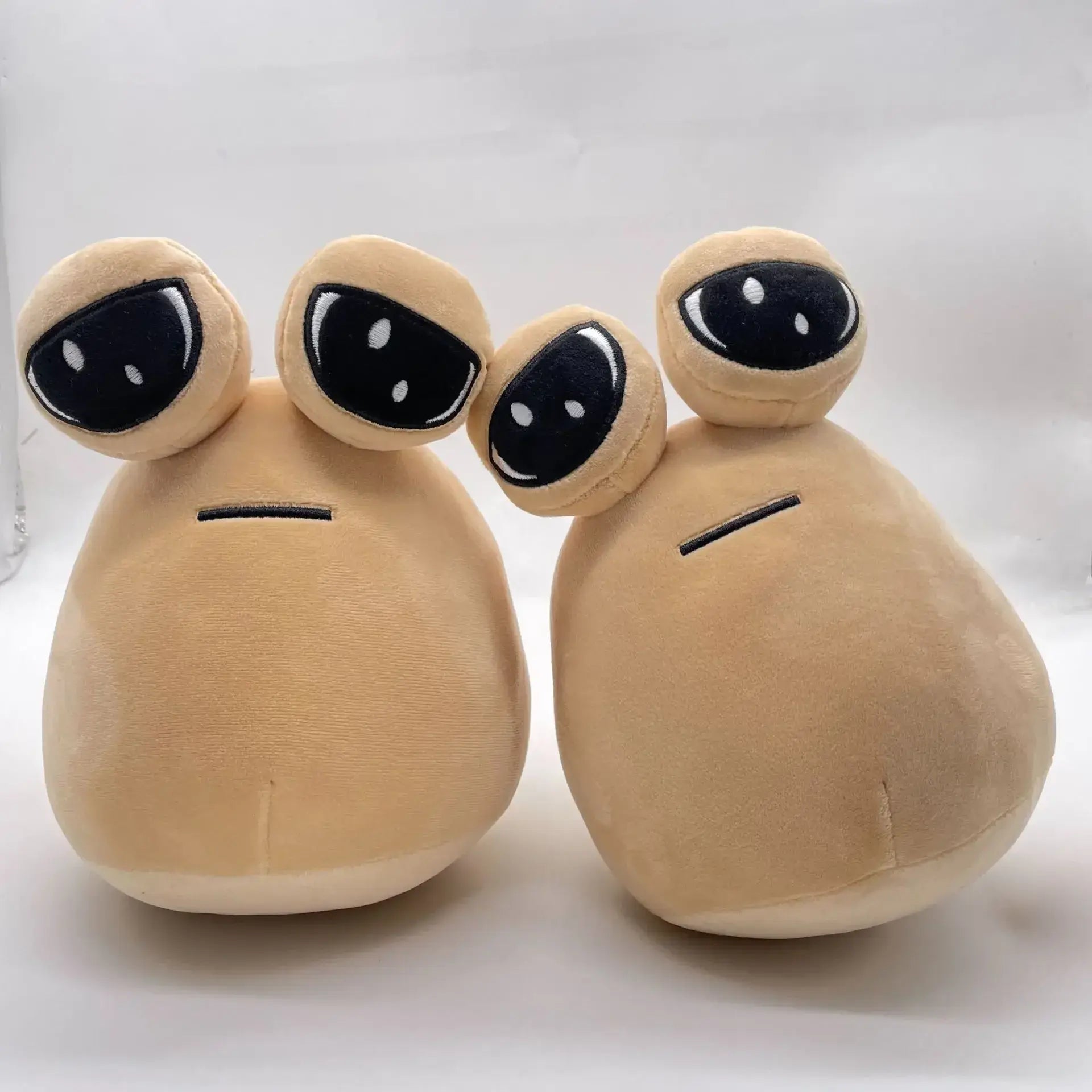 Funny cuddly toy shaped like a cartoon alien