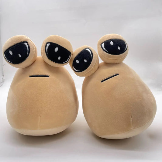 Funny cuddly toy shaped like a cartoon alien
