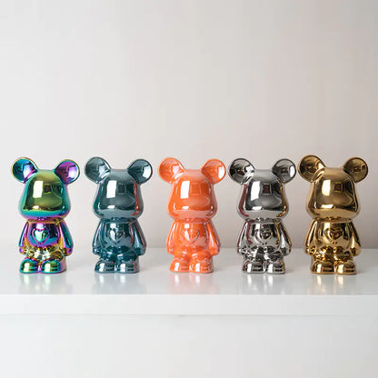 Front view of glossy bear ornament with sculptural detailing