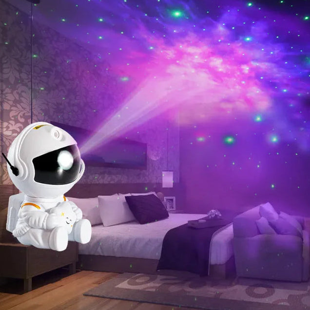 White astronaut star projector lamp casting galaxy lights in bedroom – night light for kids or teens